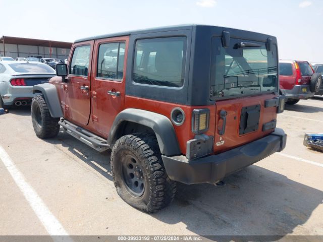 1C4BJWDG0EL216954 Jeep Wrangler Unlimited Sport