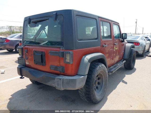 1C4BJWDG0EL216954 Jeep Wrangler Unlimited Sport