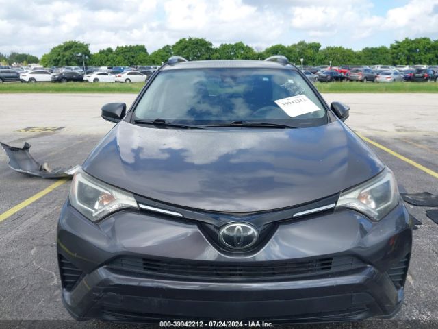 JTMZFREVXJJ189380 Toyota RAV4 LE