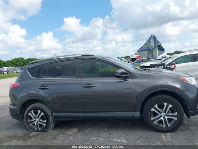 JTMZFREVXJJ189380 Toyota RAV4 LE