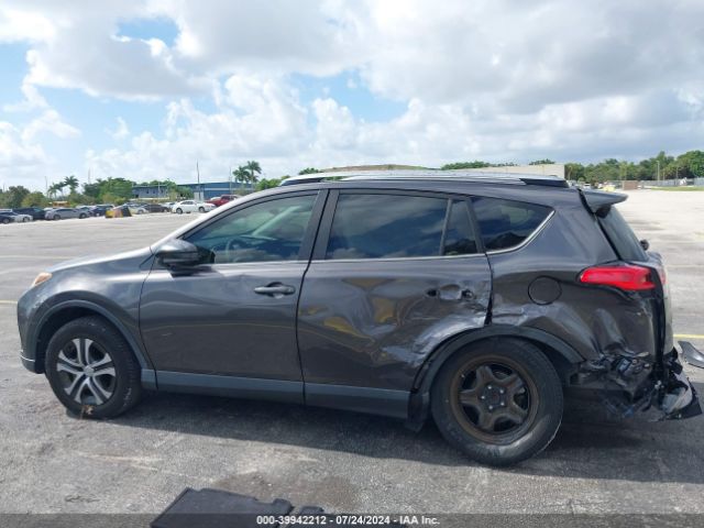 JTMZFREVXJJ189380 Toyota RAV4 LE