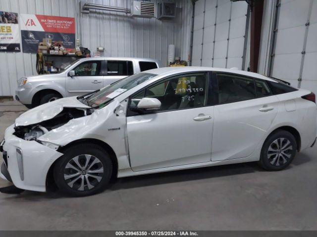 JTDL9RFU8L3021814 Toyota Prius Le Awd-e