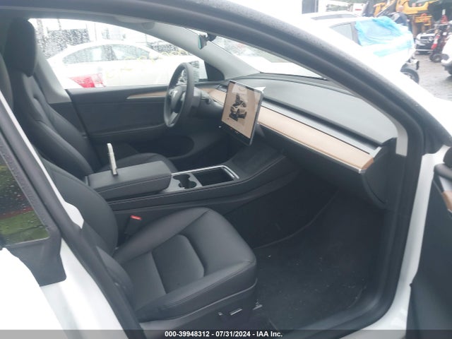 2023 TESLA MODEL Y 7SAYGDEE2PA188882 Photo 4
