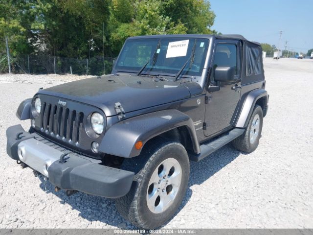 1C4AJWBG5EL220769 Jeep Wrangler Sahara