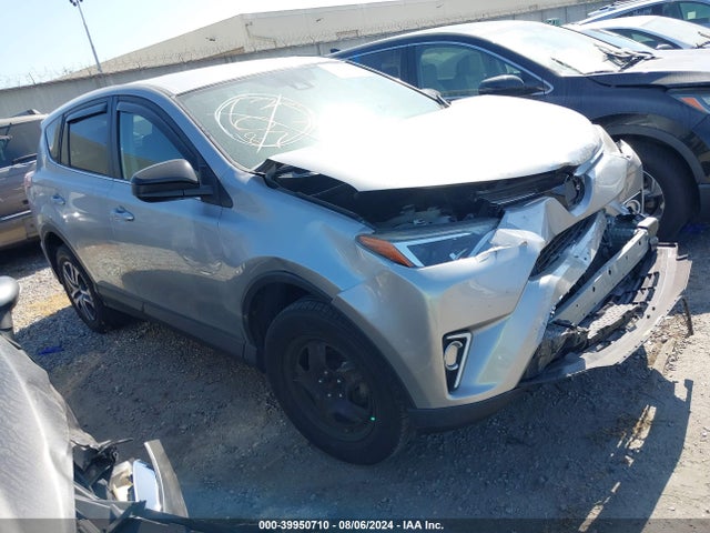 Toyota RAV4 LE 2018 2T3ZFREV4JW443974 Image 1
