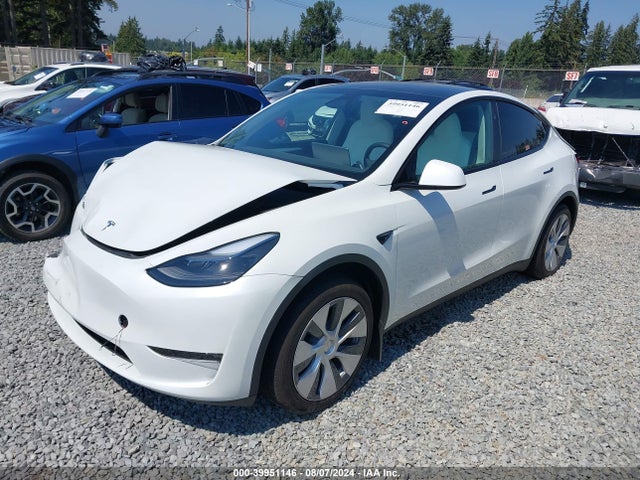 2024 TESLA MODEL Y 7SAYGAEE5RF077456 Photo 1