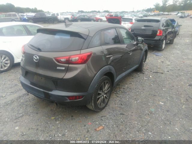 JM1DKFC74H0164094 Mazda Cx-3 Touring