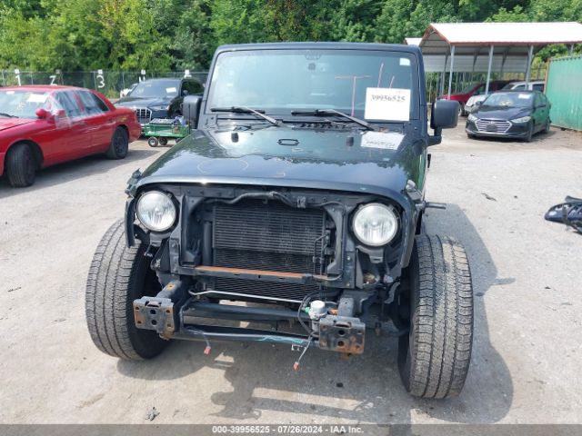 1C4BJWDG8EL127827 Jeep Wrangler Unlimited Sport