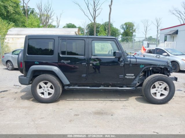 1C4BJWDG8EL127827 Jeep Wrangler Unlimited Sport