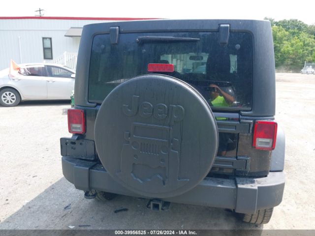 1C4BJWDG8EL127827 Jeep Wrangler Unlimited Sport