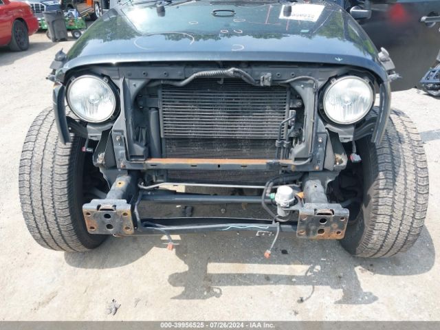 1C4BJWDG8EL127827 Jeep Wrangler Unlimited Sport