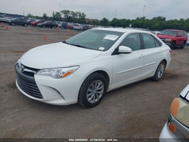 4T1BF1FK4GU999792 Toyota CAMRY LE