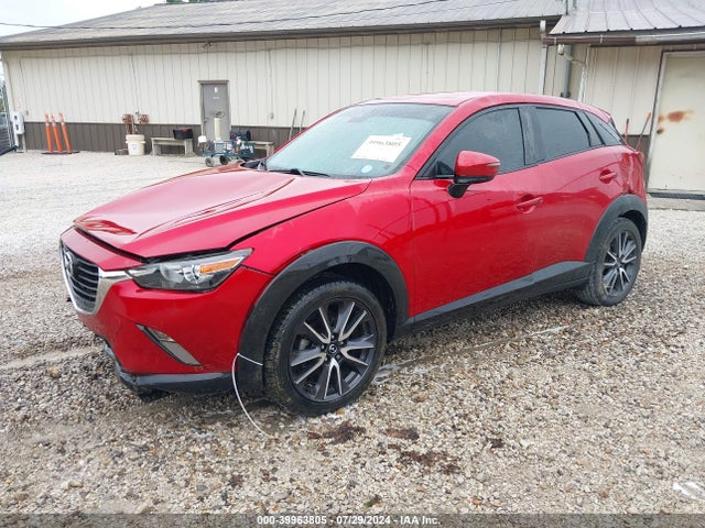 JM1DKDC78J0315495 Mazda Cx-3 Touring
