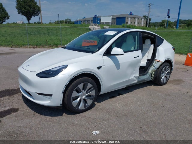 2024 TESLA MODEL Y 7SAYGDEE0RA250606 Photo 1