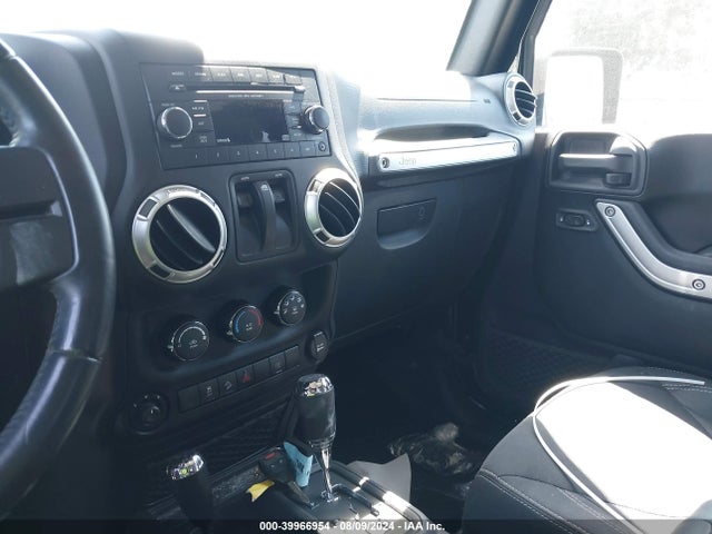 1C4AJWBG9GL208787 Jeep Wrangler Sahara