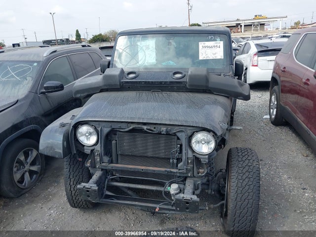 1C4AJWBG9GL208787 Jeep Wrangler Sahara