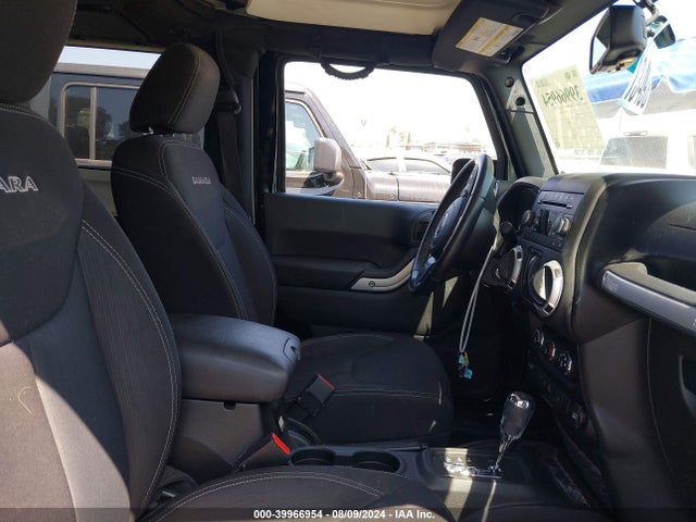 1C4AJWBG9GL208787 Jeep Wrangler Sahara