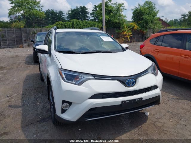 JTMRJREV2JD180234 Toyota Rav4 Hybrid Xle