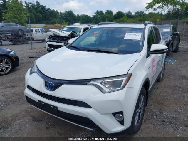 JTMRJREV2JD180234 Toyota Rav4 Hybrid Xle