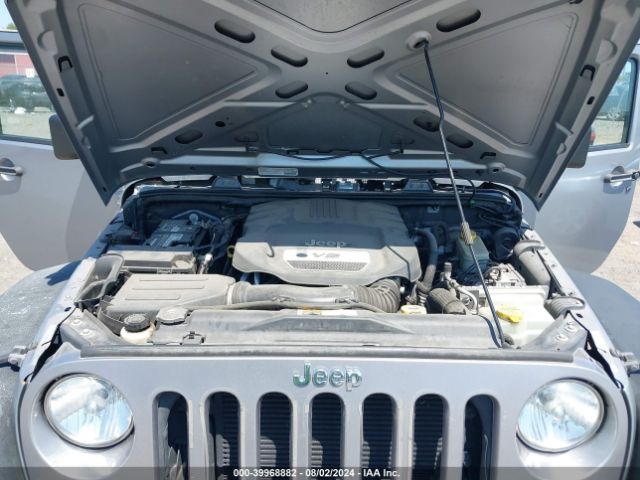 1C4BJWDG9EL116111 Jeep Wrangler Unlimited Sport