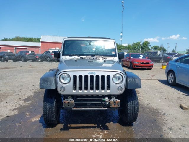 1C4BJWDG9EL116111 Jeep Wrangler Unlimited Sport
