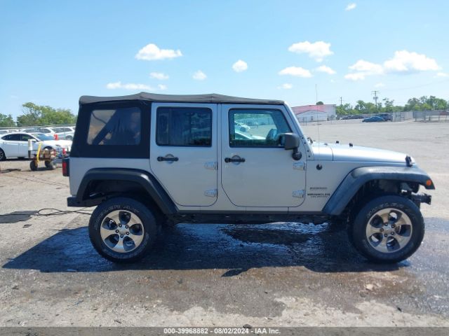 1C4BJWDG9EL116111 Jeep Wrangler Unlimited Sport