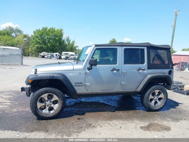 1C4BJWDG9EL116111 Jeep Wrangler Unlimited Sport