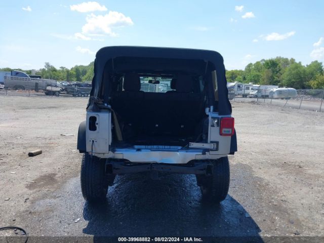 1C4BJWDG9EL116111 Jeep Wrangler Unlimited Sport