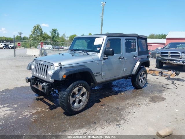 1C4BJWDG9EL116111 Jeep Wrangler Unlimited Sport