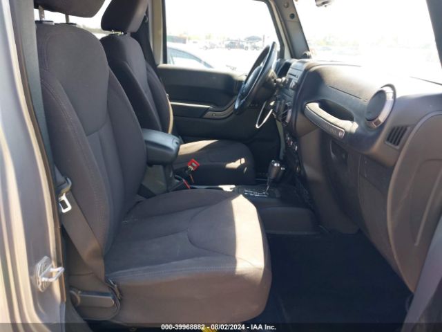 1C4BJWDG9EL116111 Jeep Wrangler Unlimited Sport