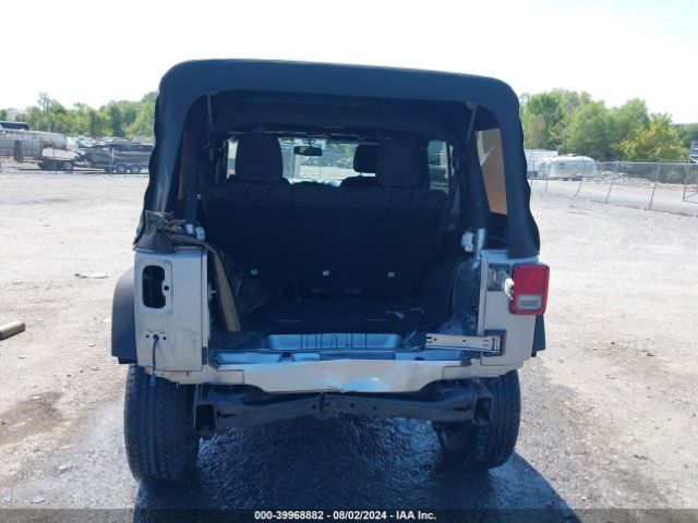 1C4BJWDG9EL116111 Jeep Wrangler Unlimited Sport