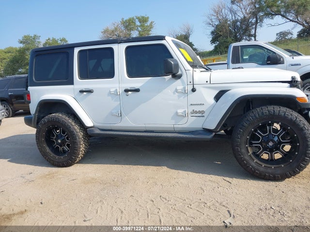 1C4HJXEG5JW140557 Jeep Wrangler Unlimited Sahara 4x4