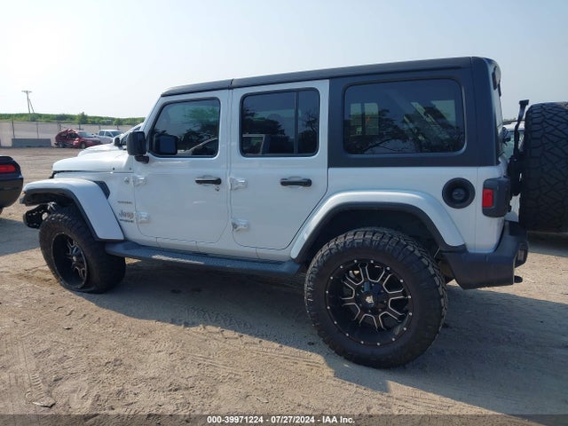 1C4HJXEG5JW140557 Jeep Wrangler Unlimited Sahara 4x4