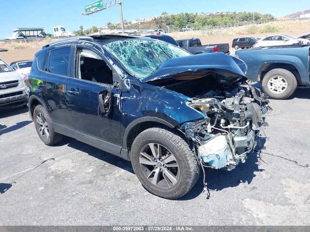 2018 JTMWFREV1JJ154097 main image