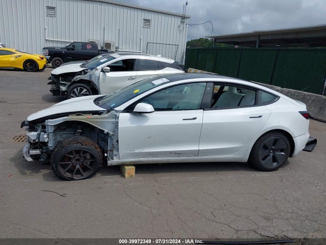5YJ3E1EA4MF851795 Tesla Model 3 Standard Range Plus Rear-wheel Drive