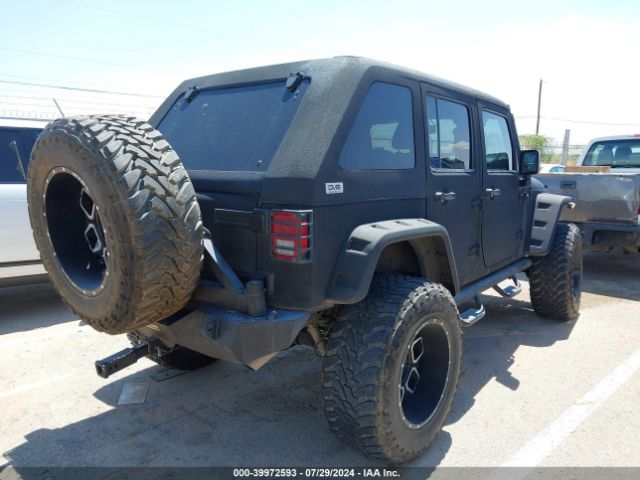1C4HJWEG9FL631247 Jeep Wrangler Unlimited Sahara