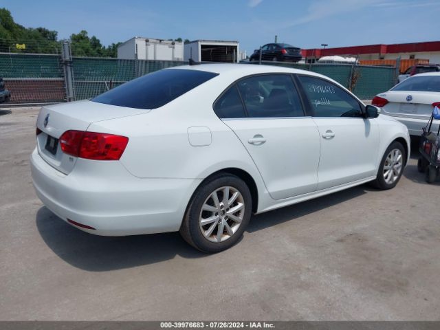 3VWD17AJ7EM304118 Volkswagen Jetta 1.8t Se