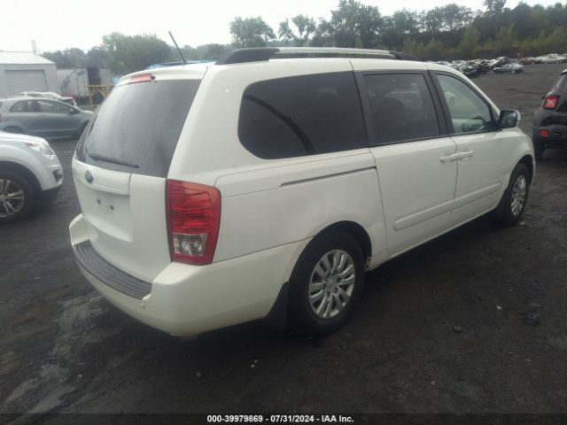 KNDMG4C79E6571813 KIA SEDONA LX