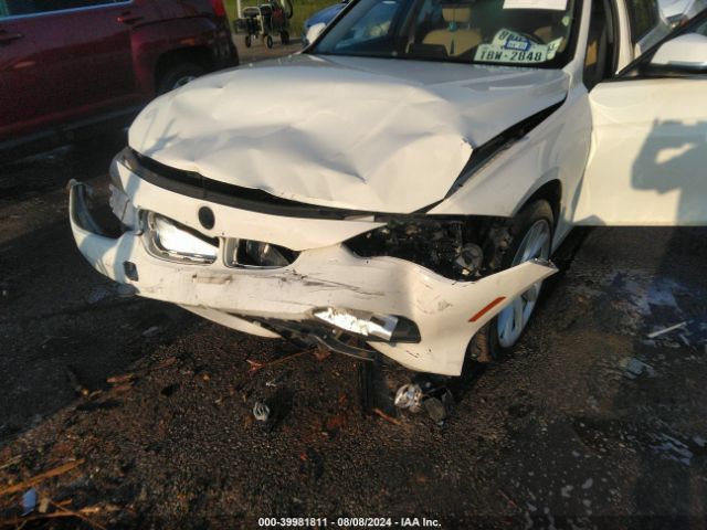 WBA8A9C59JAD27861 BMW 320i