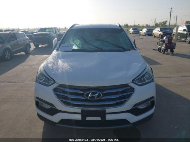 5NMZU3LB7JH060028 Hyundai Santa Fe Sport 2.4l