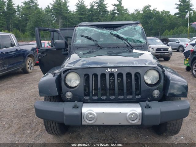 1C4BJWEG7EL234088 Jeep Wrangler Unlimited Sahara