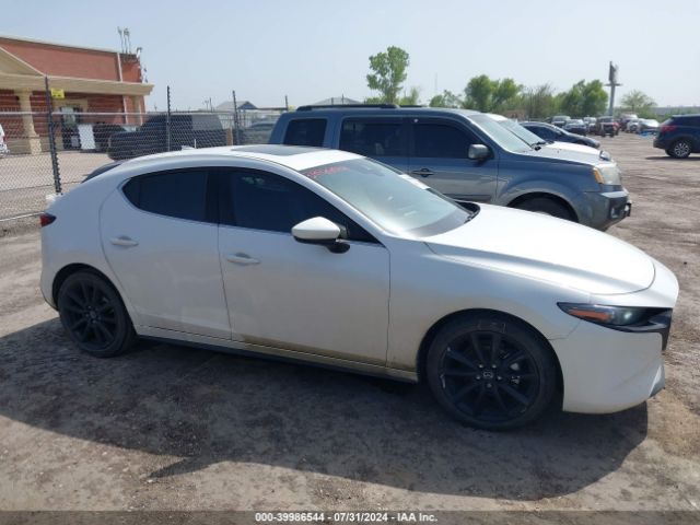JM1BPAML2M1401063 Mazda Mazda3 Premium