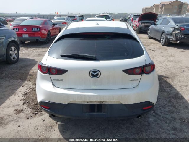 JM1BPAML2M1401063 Mazda Mazda3 Premium