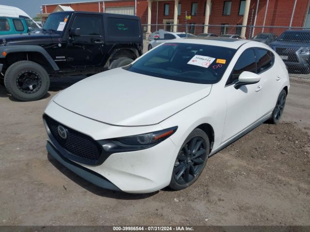 JM1BPAML2M1401063 Mazda Mazda3 Premium
