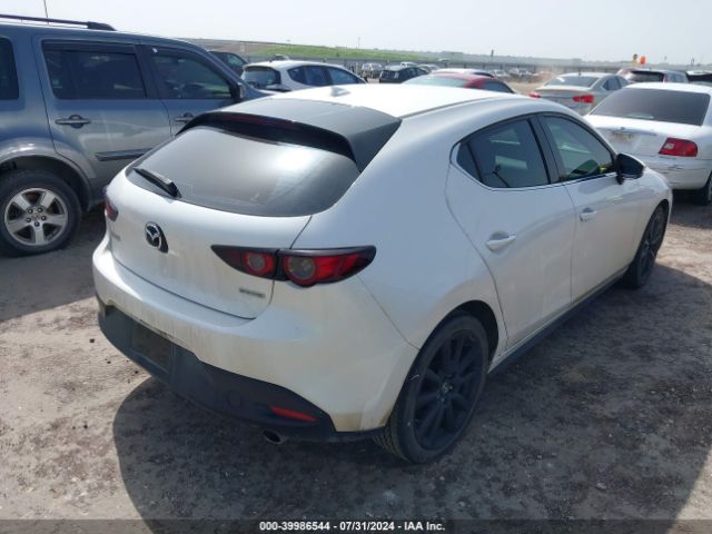 JM1BPAML2M1401063 Mazda Mazda3 Premium