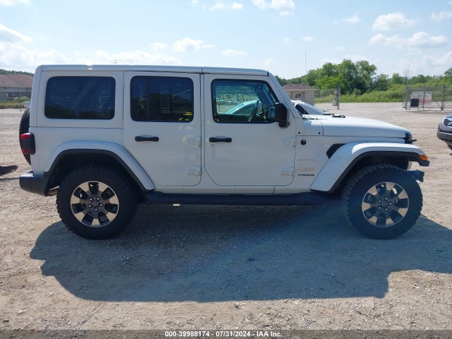 1C4HJXEG0JW184921 Jeep Wrangler Unlimited Sahara 4x4