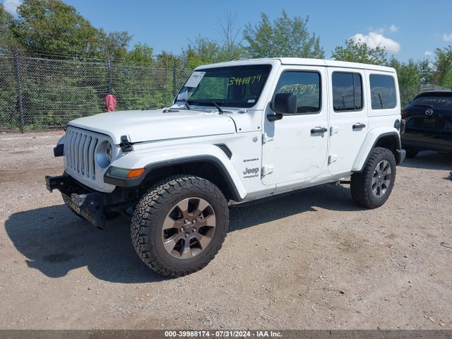 1C4HJXEG0JW184921 Jeep Wrangler Unlimited Sahara 4x4
