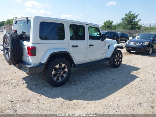 1C4HJXEG0JW184921 Jeep Wrangler Unlimited Sahara 4x4