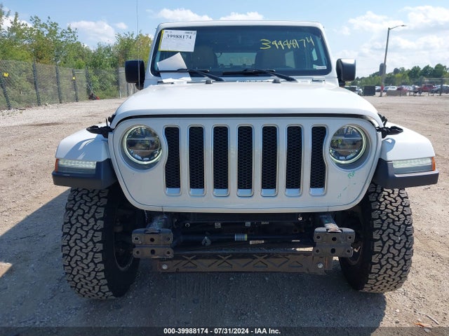 1C4HJXEG0JW184921 Jeep Wrangler Unlimited Sahara 4x4