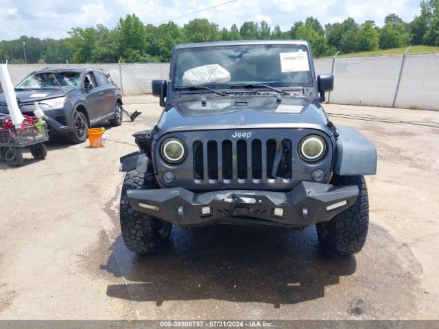 1C4BJWDG7GL337256 Jeep Wrangler Unlimited Sport